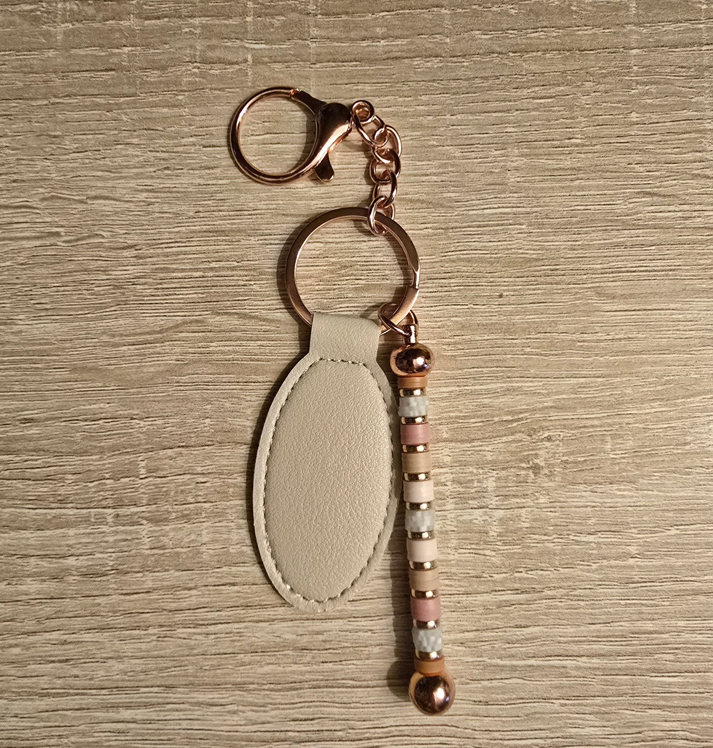 Beige oval keychain