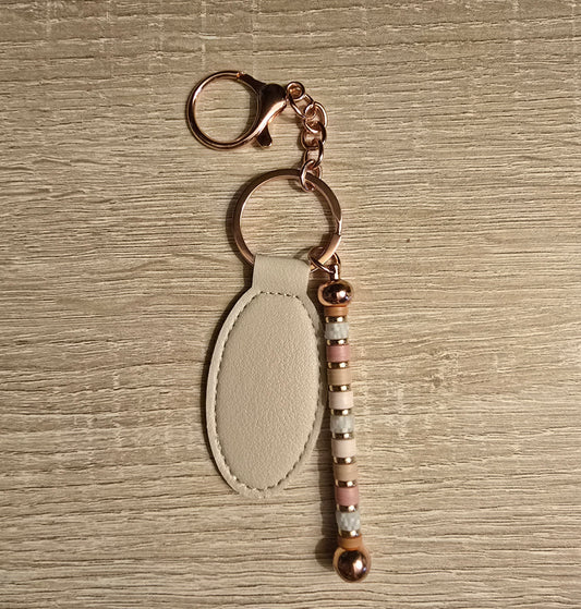 Beige oval keychain