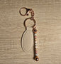 Beige oval keychain